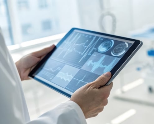 monitoring sepsis treatment via Machine Learning, Intensive Care Doctor analyzing data on a tablet 