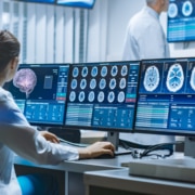 Team of Neurologists Monitoring Stroke Patients / Reviewing CT, MRI Scans