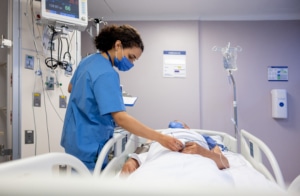Nurse checking patient for sepsis at the hospital